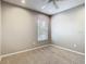 Cozy bedroom featuring neutral carpet, a ceiling fan, and a window with blinds at 2641 Delcrest Dr, Orlando, FL 32817