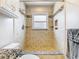 Walk-in shower featuring stone-look tile, mosaic accents, and bench seating at 2641 Delcrest Dr, Orlando, FL 32817