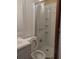 Bathroom featuring a single sink vanity and a shower at 6971 Pompeii Rd, Orlando, FL 32822