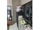Bedroom with a dresser with a mirror at 6971 Pompeii Rd, Orlando, FL 32822