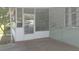 Covered porch entrance offering a shaded outdoor space adjacent to the home's exterior at 6971 Pompeii Rd, Orlando, FL 32822