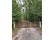 A gated entrance welcomes you to this private and serene property at 10411 County Road 474, Clermont, FL 34714