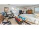 Spacious bedroom with lots of natural light, large bed, and room for exercise equipment at 418 W Holly Dr, Orange City, FL 32763