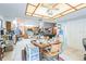 Spacious kitchen and dining area with tiled floors and a ceiling fan at 418 W Holly Dr, Orange City, FL 32763