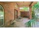 Brick facade of home with covered front porch at 418 W Holly Dr, Orange City, FL 32763