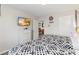 Nautical-themed bedroom with two beds, TV, and charming decor evoking a seaside adventure at 5545 Misty Oak Cir, Davenport, FL 33837