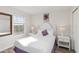 Cozy bedroom with stylish decor, soft lighting, and a comfortable bed at 5545 Misty Oak Cir, Davenport, FL 33837