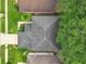 Birds eye view of the house showing the roof and surrounding mature landscaping and lawn at 9525 Southern Garden Cir, Altamonte Springs, FL 32714