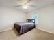 Bedroom with neutral walls and carpet offering natural light at 9525 Southern Garden Cir, Altamonte Springs, FL 32714