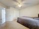 Bedroom with neutral carpet, fan and natural light at 9525 Southern Garden Cir, Altamonte Springs, FL 32714