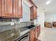 Close up on the kitchen countertop shows the black sink and mosaic backsplash at 9525 Southern Garden Cir, Altamonte Springs, FL 32714