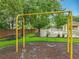 Community playground featuring swings, picnic tables, and well-maintained landscaping for Gathering enjoyment at 9525 Southern Garden Cir, Altamonte Springs, FL 32714