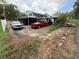 Backyard with parking and utility vehicles at 2094 Penn Dr, Deland, FL 32724