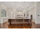 Spacious kitchen with custom cabinets, oversized wood island and luxury finishes, perfect for entertaining at 8707 Nw 31St Lane Rd, Ocala, FL 34482