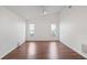 Spacious bedroom with wood floors, vaulted ceilings, and natural light at 294 Lake Doe Blvd, Apopka, FL 32703
