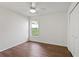 Bedroom with natural light, ceiling fan, and hardwood floors at 294 Lake Doe Blvd, Apopka, FL 32703