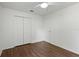 Bedroom with hardwood floors and closet at 294 Lake Doe Blvd, Apopka, FL 32703
