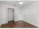 Bedroom featuring hardwood floors and a closet at 294 Lake Doe Blvd, Apopka, FL 32703