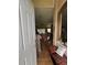 Welcoming entryway featuring tile flooring and a comfortable bench with decorative pillows at 440 Bay Leaf Dr, Kissimmee, FL 34759