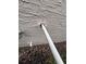 Image of a pipe entering the house through a hole in the exterior wall at 440 Bay Leaf Dr, Kissimmee, FL 34759