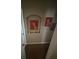 Hallway featuring recessed display shelves with decorative art pieces at 440 Bay Leaf Dr, Kissimmee, FL 34759