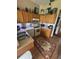 Well-equipped kitchen featuring wooden cabinets, modern appliances, and a cozy rug at 440 Bay Leaf Dr, Kissimmee, FL 34759