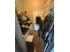 Functional laundry room with washer, dryer and convenient storage shelves and cabinets at 440 Bay Leaf Dr, Kissimmee, FL 34759