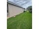 A spacious well-manicured backyard offers ample room for various outdoor activities at 440 Bay Leaf Dr, Kissimmee, FL 34759