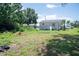 View of backyard with house in the distance at 7043 Curtis Ave, Groveland, FL 34736
