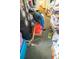 Hallway full of personal belongings that could use some organization at 7043 Curtis Ave, Groveland, FL 34736