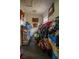 Hallway filled with clutter, boxes, and piled-up belongings at 7043 Curtis Ave, Groveland, FL 34736