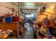 Kitchen is very cluttered and full of personal items, covering surfaces and appliances at 7043 Curtis Ave, Groveland, FL 34736