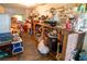 Pantry shows a variety of stored goods and supplies stacked and organized on shelving units at 7043 Curtis Ave, Groveland, FL 34736