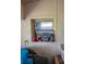 Window ledge with scattered items and personal care products in a small room at 7043 Curtis Ave, Groveland, FL 34736