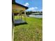 The back yard has a covered patio and new fence, offering space for recreation and relaxation at 13074 Sw 104Th Ln, Dunnellon, FL 34432