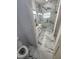 Bathroom with a toilet, sink, and marble shower at 13074 Sw 104Th Ln, Dunnellon, FL 34432