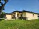 Single Gathering home showing nice landscaping and craftsman style at 13074 Sw 104Th Ln, Dunnellon, FL 34432