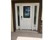 Elegant front door with glass panels and decorative details at 13074 Sw 104Th Ln, Dunnellon, FL 34432