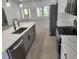 Kitchen featuring a large island with quartz countertops, stainless steel appliances, and an open layout at 13074 Sw 104Th Ln, Dunnellon, FL 34432