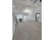 Bright and airy living space with tile flooring, connecting seamlessly to the kitchen at 13074 Sw 104Th Ln, Dunnellon, FL 34432