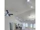 Open-concept living space with vaulted ceilings, recessed lighting, and modern finishes at 13074 Sw 104Th Ln, Dunnellon, FL 34432