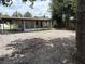 Extensive backyard includes a covered patio at 2448 Austin Ave, Deltona, FL 32738