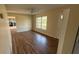 Open living space features laminate floors, natural light, and neutral colors at 2448 Austin Ave, Deltona, FL 32738