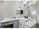 Well-lit bathroom featuring a white vanity with a vessel sink and a large mirror at 3909 Corveta Ct, Orlando, FL 32837