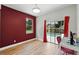 Bedroom with view of pool, desk and chair and wood floors at 3909 Corveta Ct, Orlando, FL 32837