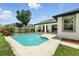 Refreshing backyard pool with a covered patio, perfect for outdoor relaxation and entertaining at 3909 Corveta Ct, Orlando, FL 32837
