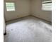 Cozy bedroom features window bringing natural light, perfect for customized renovation at 1516 Avenue D Ne, Winter Haven, FL 33881
