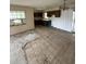 A generously sized room with attached kitchen that has great potential for renovation at 1516 Avenue D Ne, Winter Haven, FL 33881