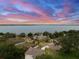 Picturesque aerial shot showcasing a lakefront community, with serene waterfront and beautiful homes at 1841 Moorings Ct, Clermont, FL 34711