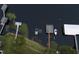 Aerial image of lake docks and boat houses, with different styles, nestled on a tranquil body of water at 1841 Moorings Ct, Clermont, FL 34711